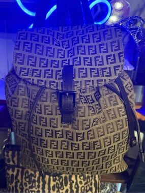 Fendi Zucca monogram canvas backpack with dark leather trim. EUC